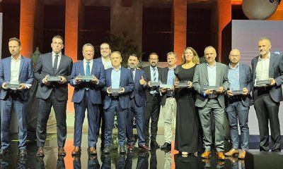 Todos los premiados posan al término de la Gala de los Premios Aúna 2023